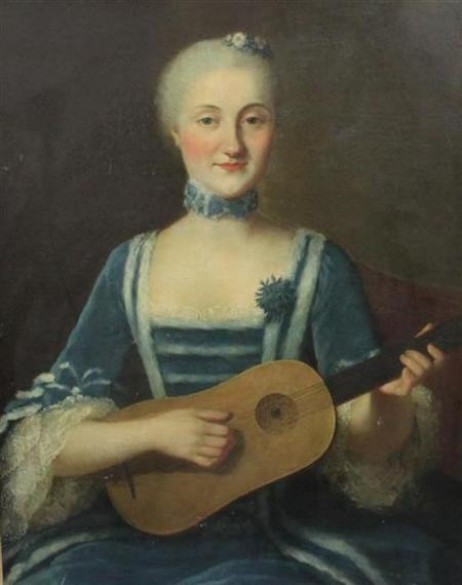 ANONYMOUS - A lady playing guitar