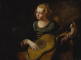 ANONYMOUS - A lady playing guitar