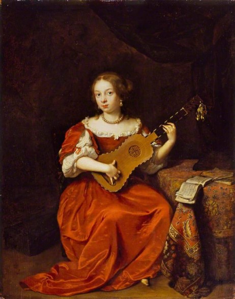 ANONYMOUS - A lady playing guitar