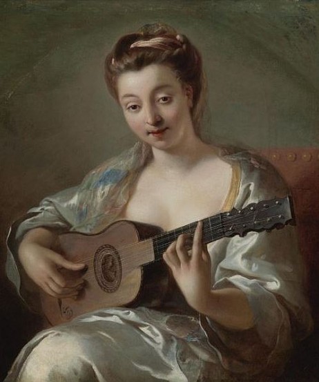 ANONYMOUS - A lady playing guitar