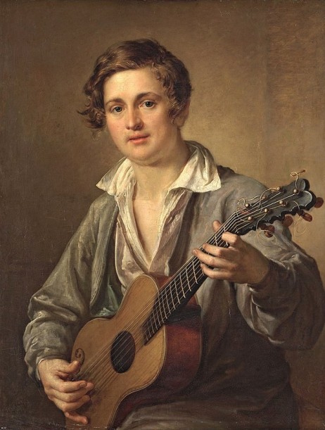 ANONYMOUS - Young man playing guitar