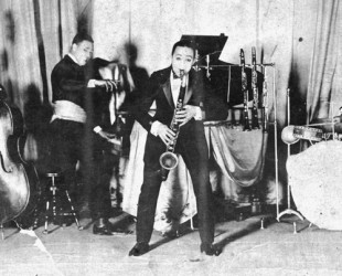 ANONYMOUS - Wilbur Sweatman (1882-1961) playing a bass clarinet