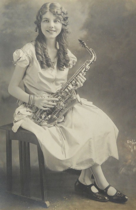 ANONYMOUS - Woman in studio with saxophone